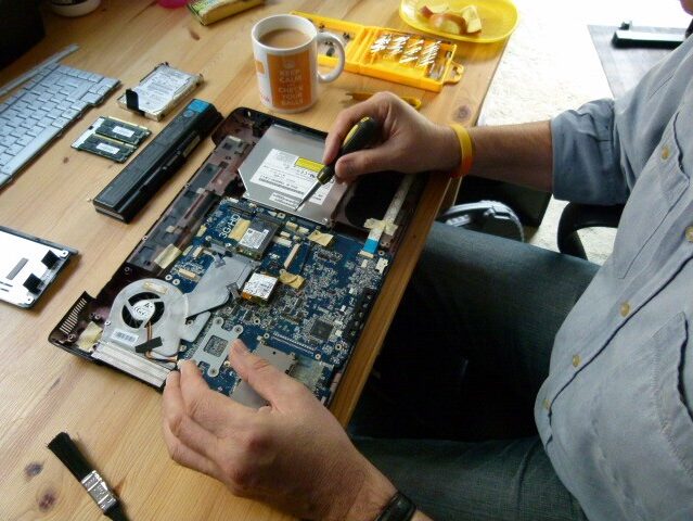 Certified technician replacing internal components during Desktop Computer Repair Dubai